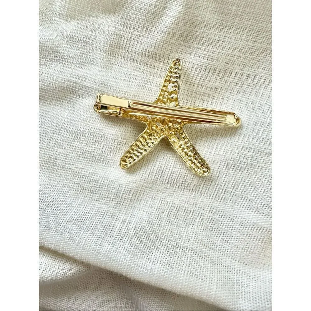 Faux pearl and gold starfish hair clip ￼